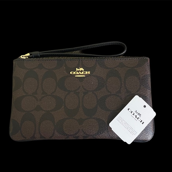 Coach Handbags - EUC Coach signature canvas large wallet wristlet